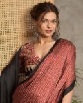 ri-wah_maroon_women_striped_saree_with_tassels.jpg