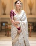 styleelite_white_women_soft_silk_saree_with_contrast_border.jpg